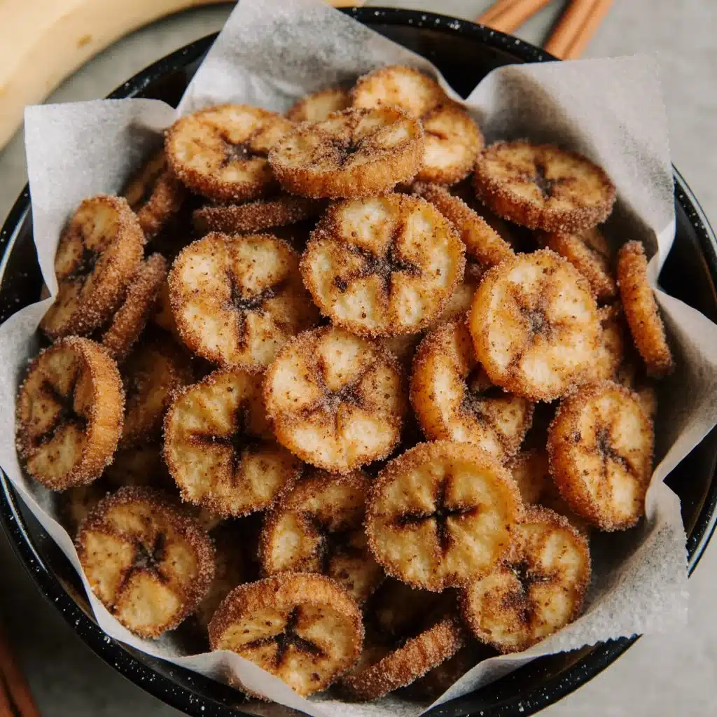 Crispy cinnamon-sugar air fryer banana chips in a bowl