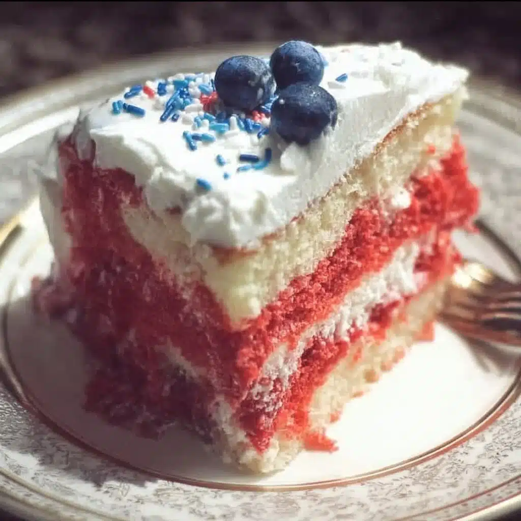 Delicious Patriotic Flag Cake decorated with red, white, and blue frosting.