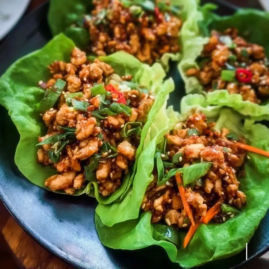 Delicious Thai Chicken Lettuce Wraps served with fresh vegetables