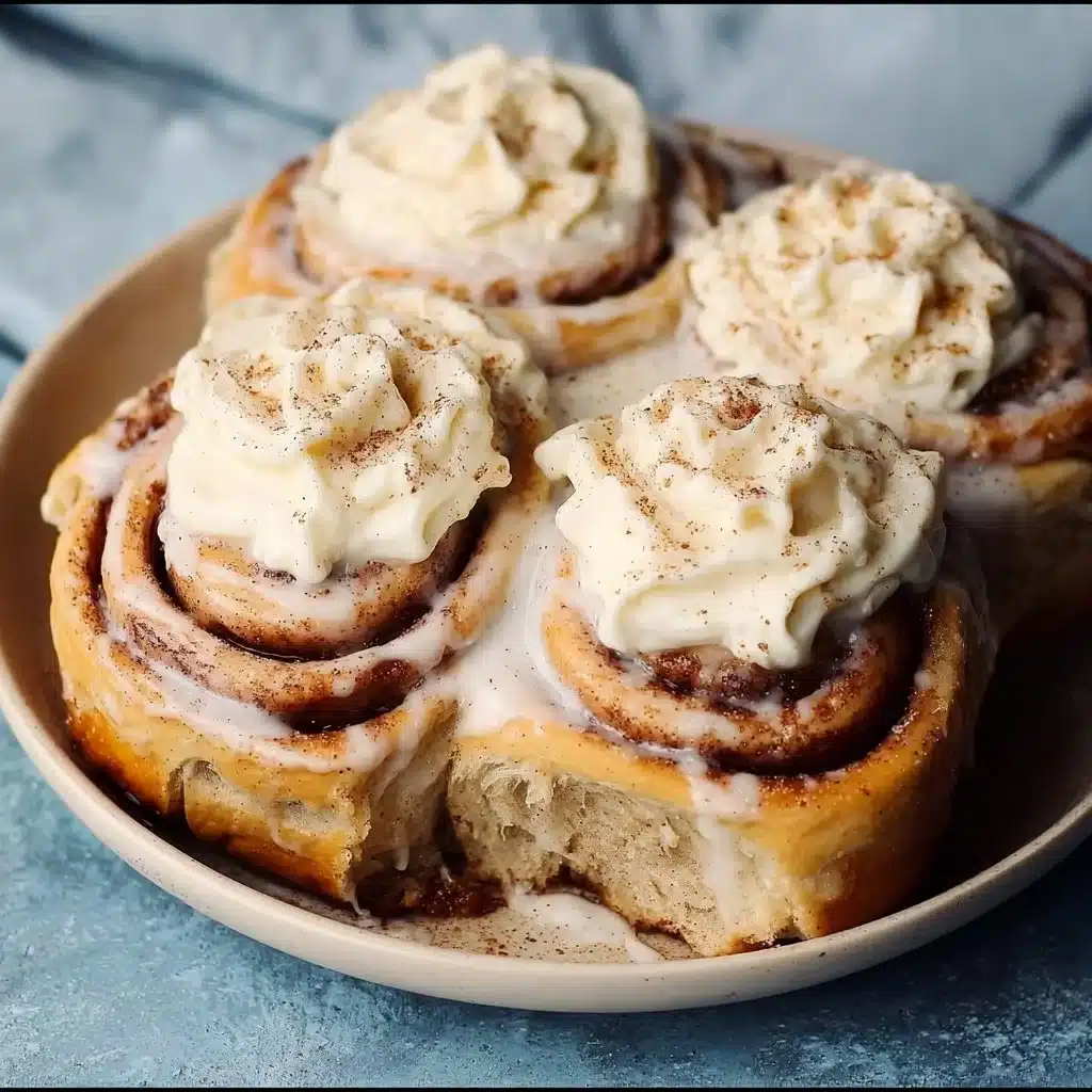 Delicious banana bread cinnamon rolls with cream cheese frosting