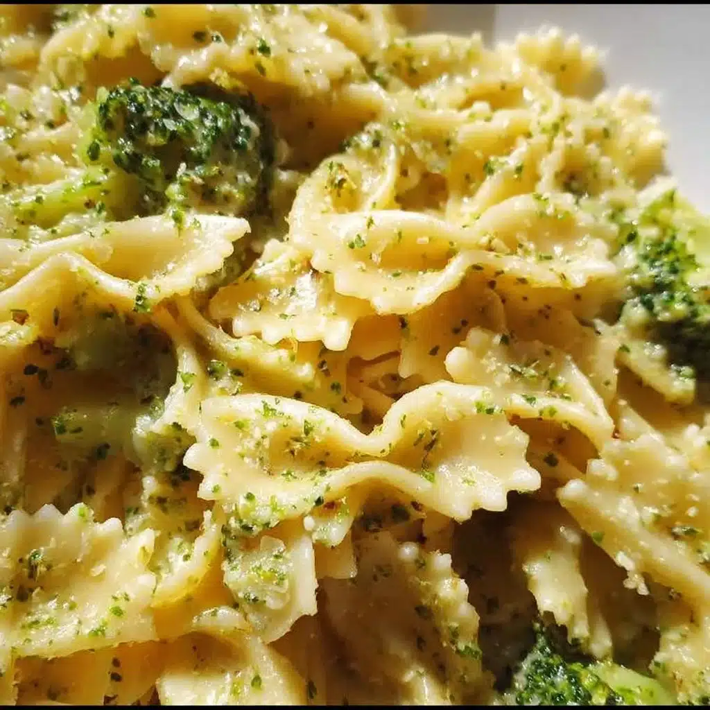 Mafaldine pasta with lemon and broccoli in a white bowl garnished with parsley